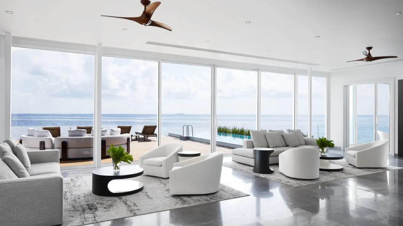 Sitting room opening onto deck and pool