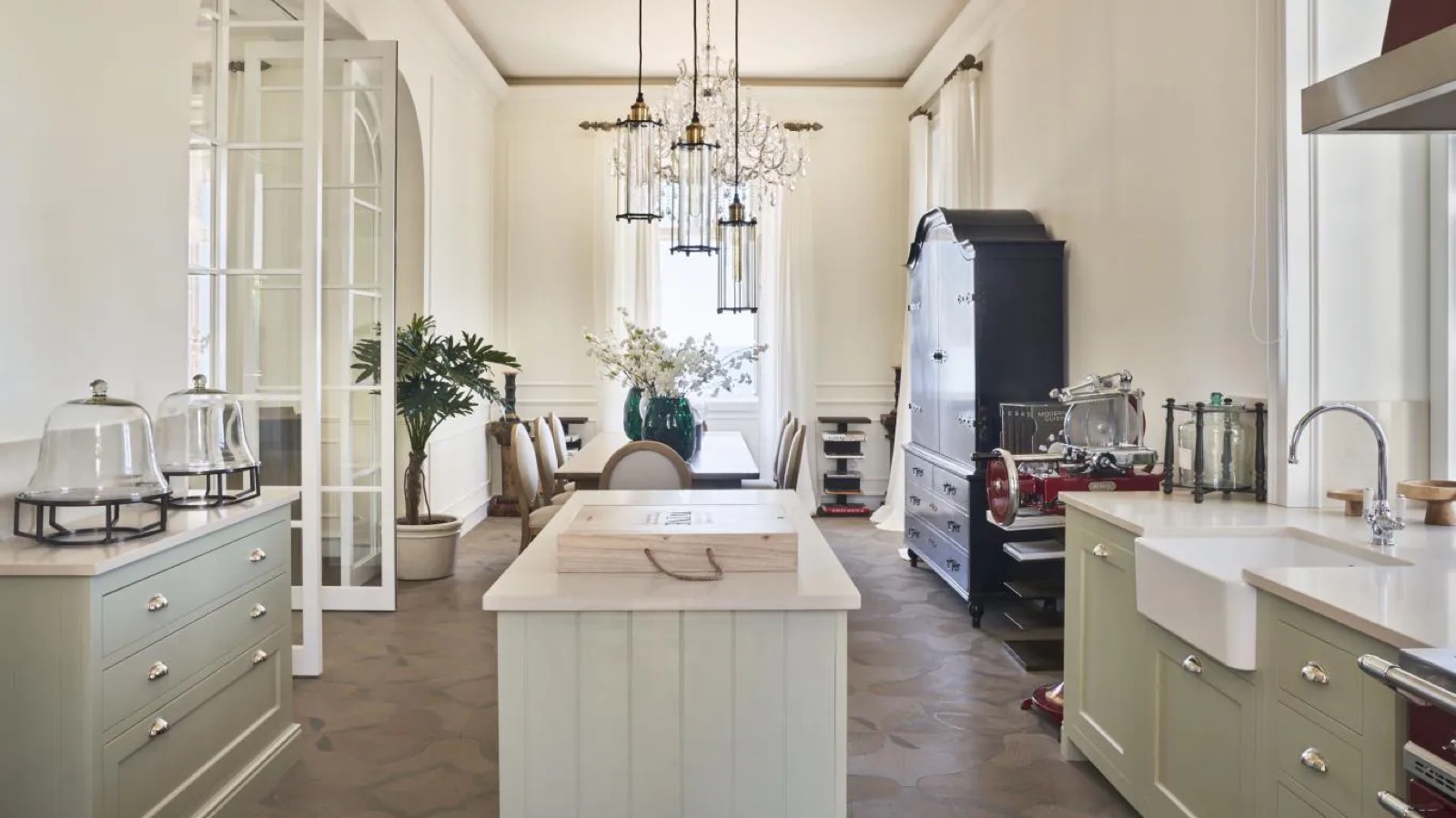 Kitchen island with butler sink and pendant lights