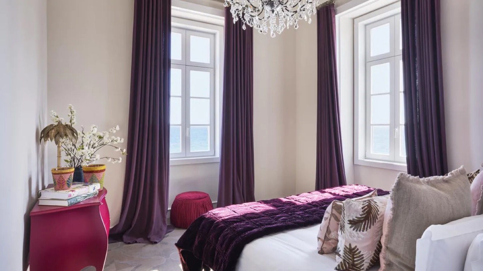 Second bedroom in plum with sea views