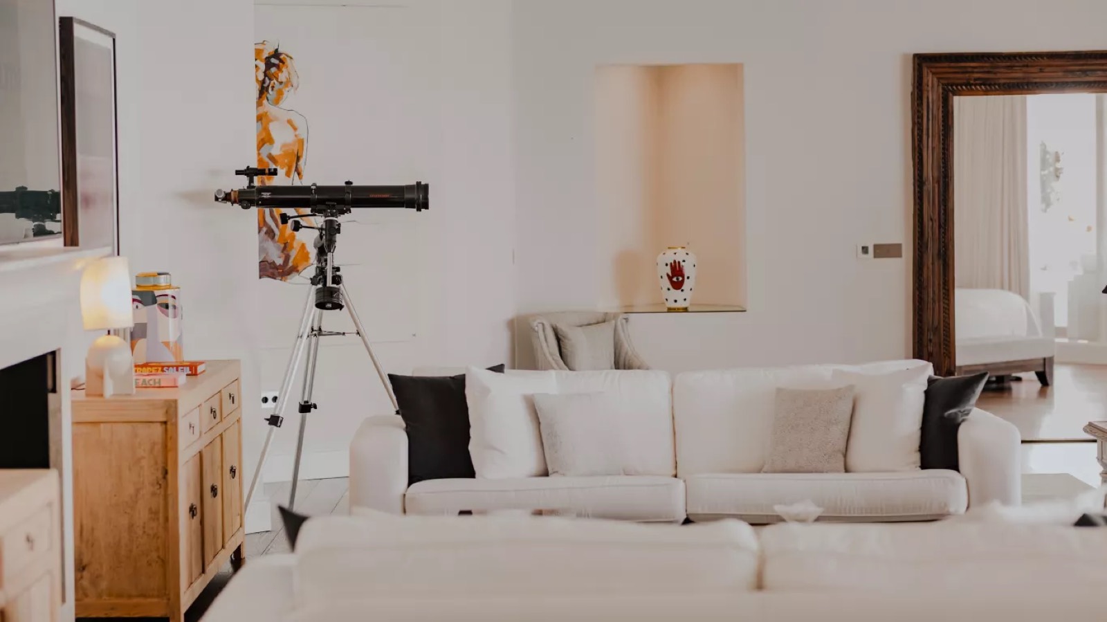 Telescope beside the seating in the lounge