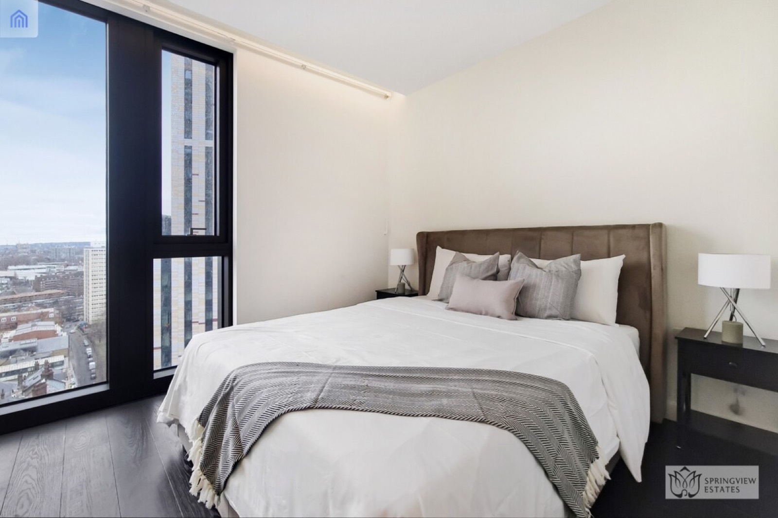 Principal bedroom with velvet headboard