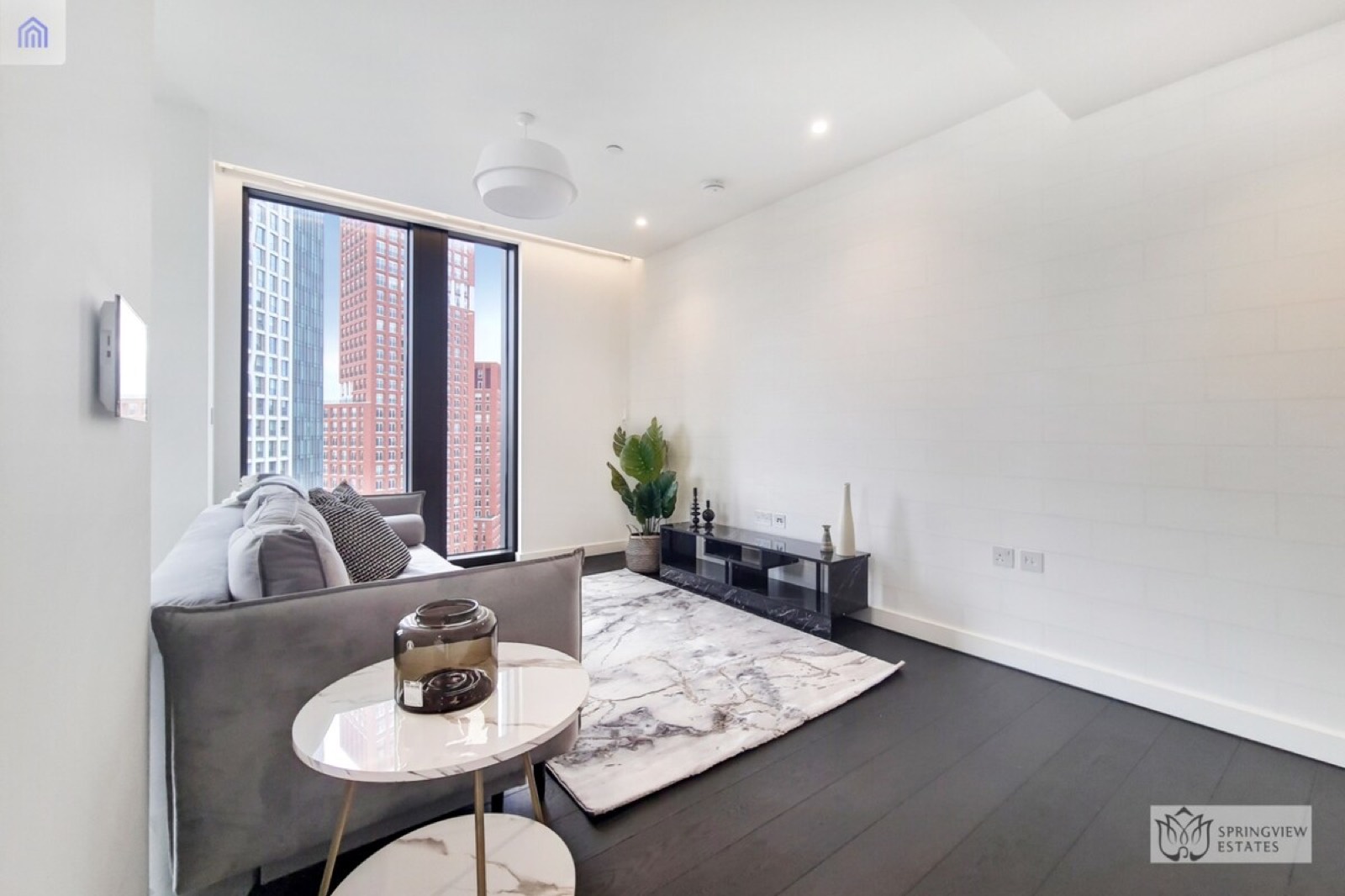 Sitting area beside the tall window