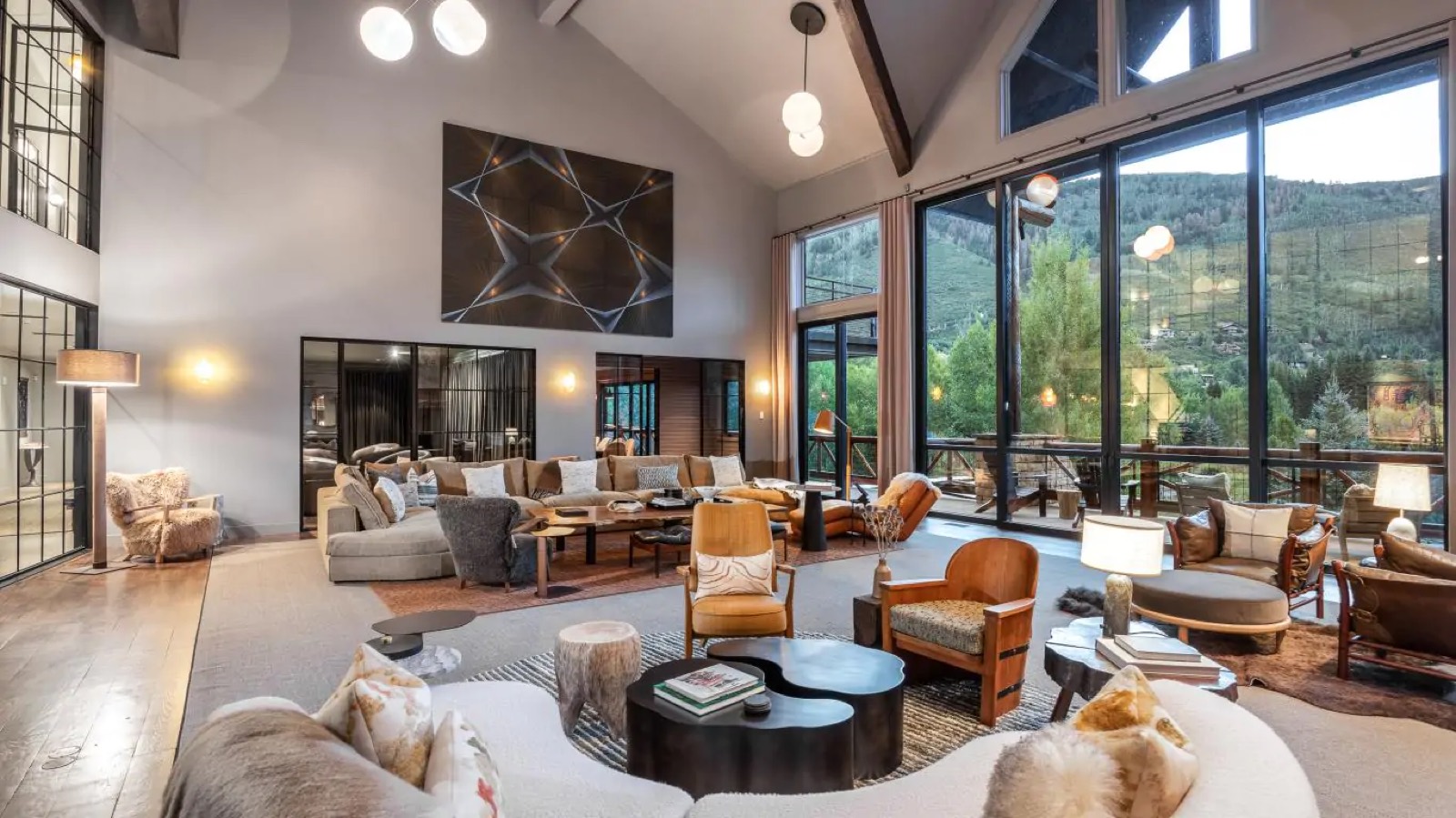 Upper lounge with windows onto the hillside