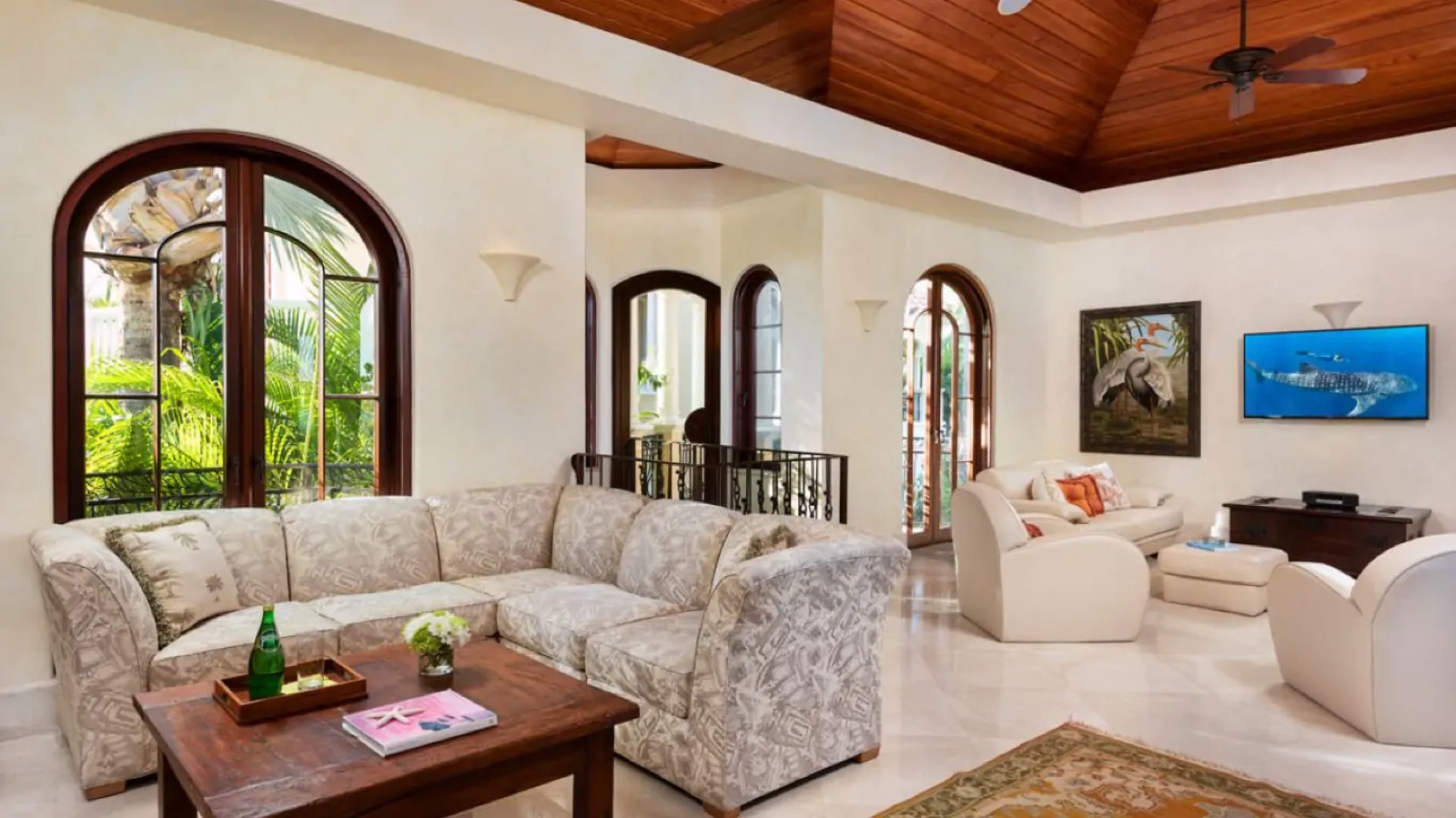 Upstairs sitting room beneath a timber ceiling