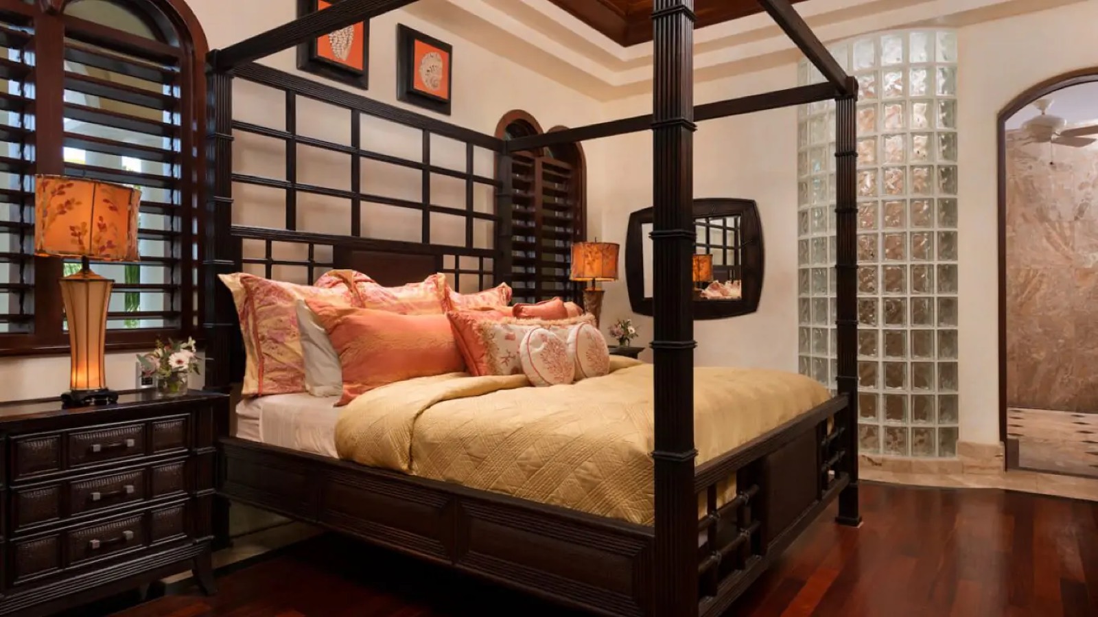 Bedroom with carved dark four-poster
