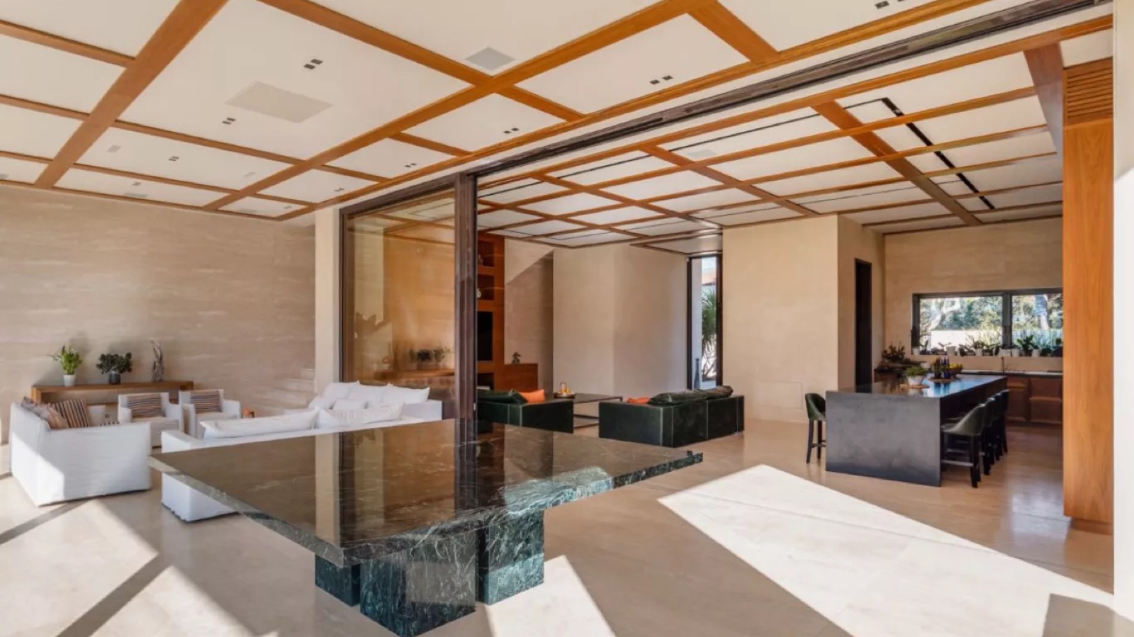 Open-plan living space with coffered timber ceiling