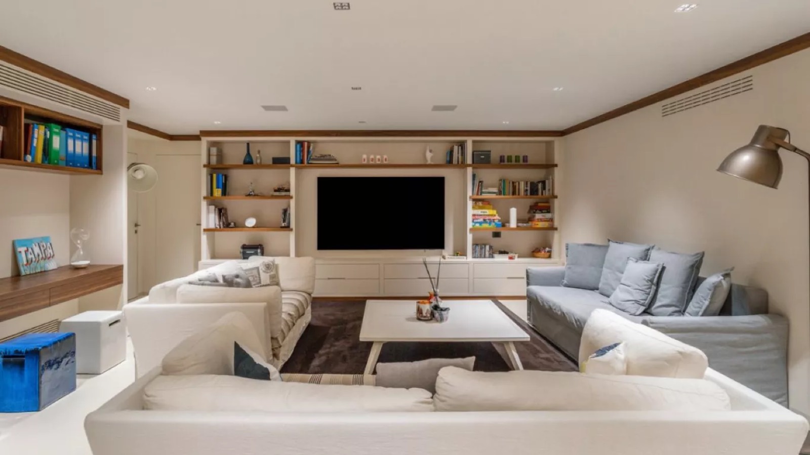 Media room with built-in shelving