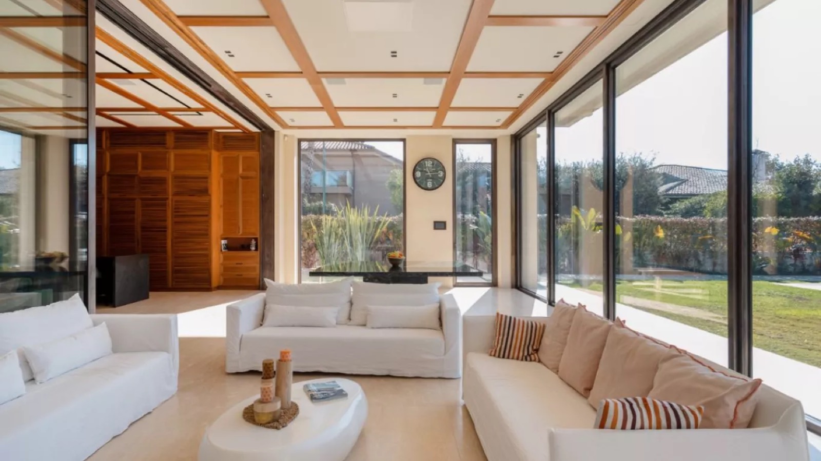 Sitting room with full-height glazing onto the garden