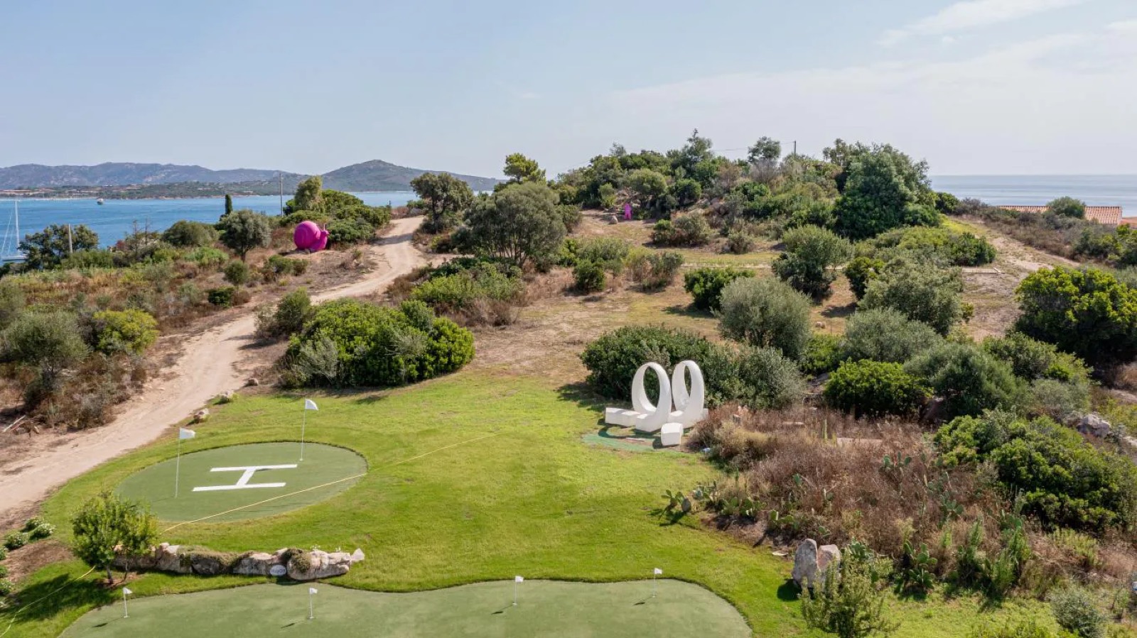 Putting green and helipad above the sea