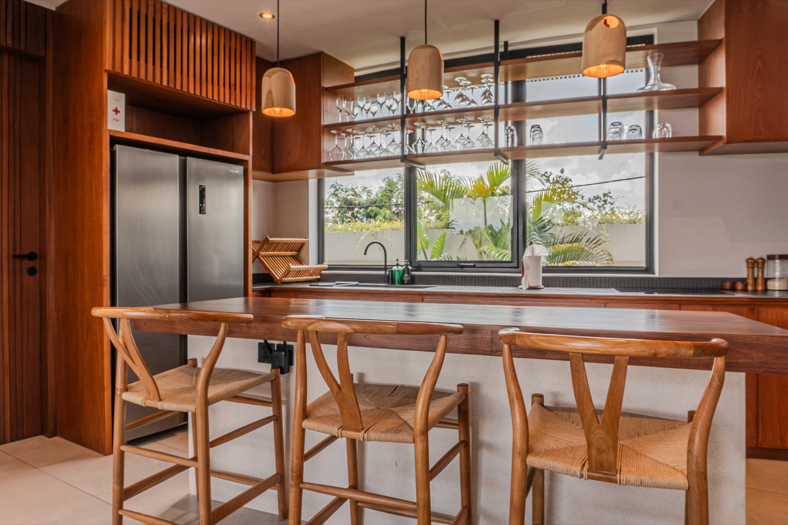 Breakfast bar with woven wishbone stools