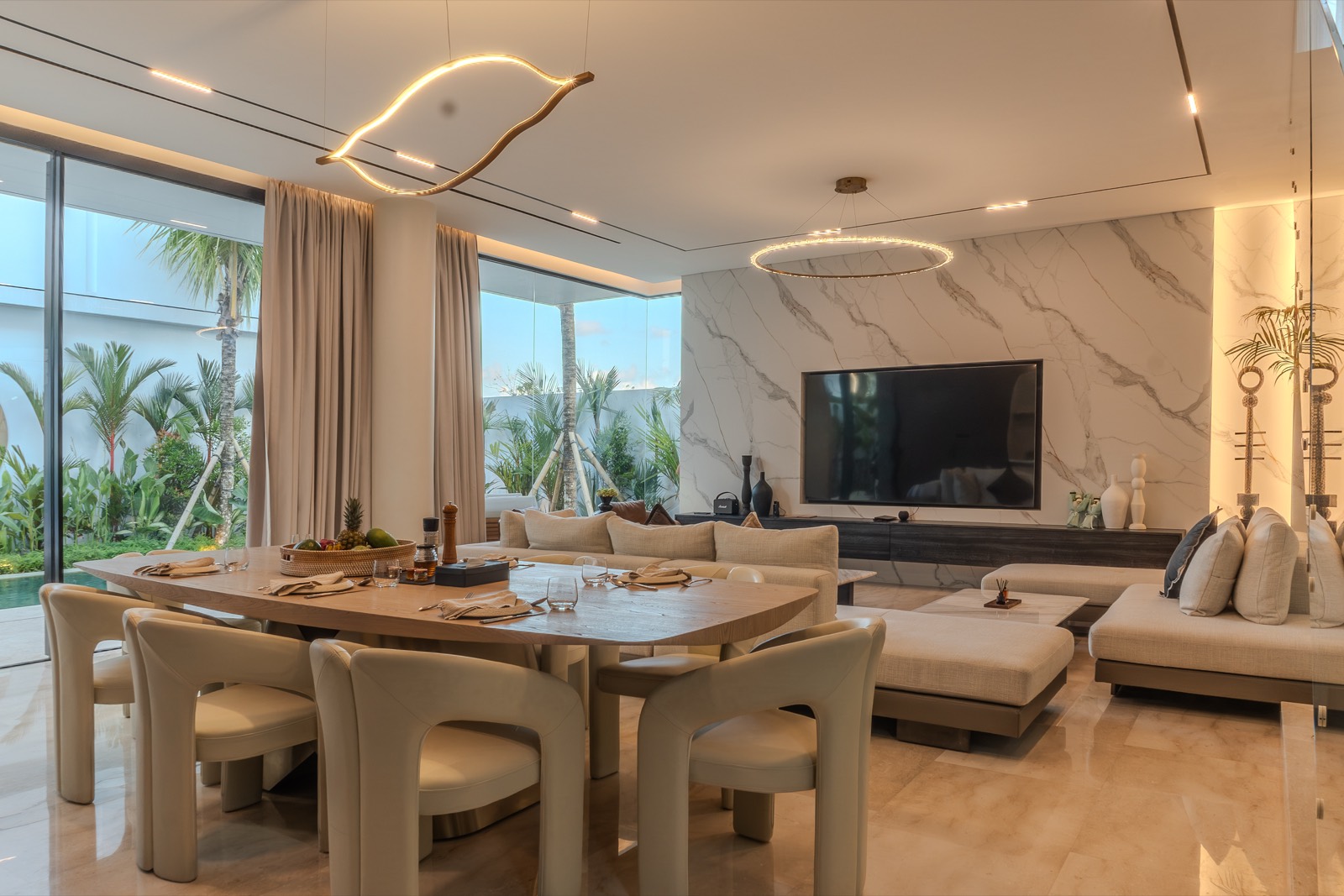 Dining table beside the floor-to-ceiling windows