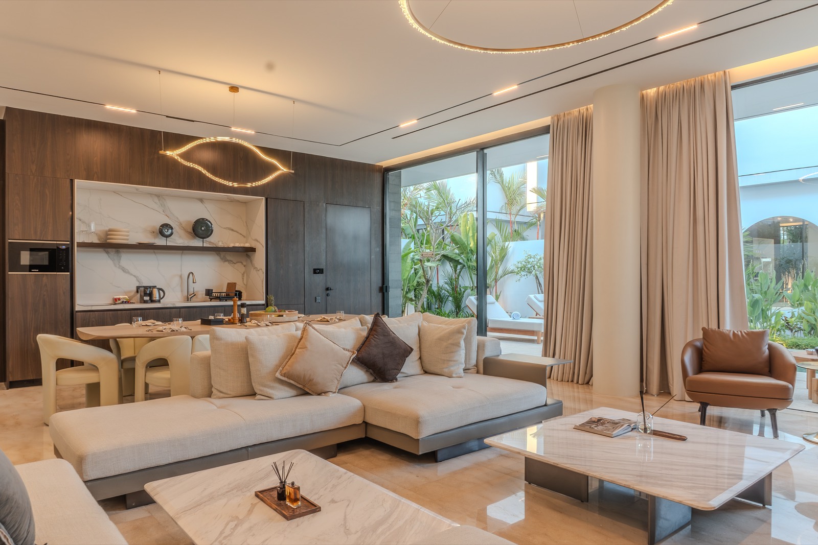 Sitting area with kitchen and dining beyond