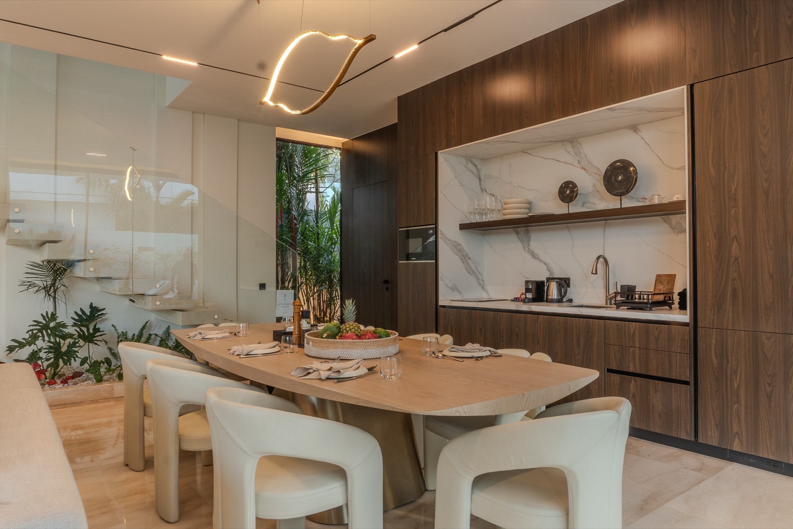 Dining table with the kitchen behind