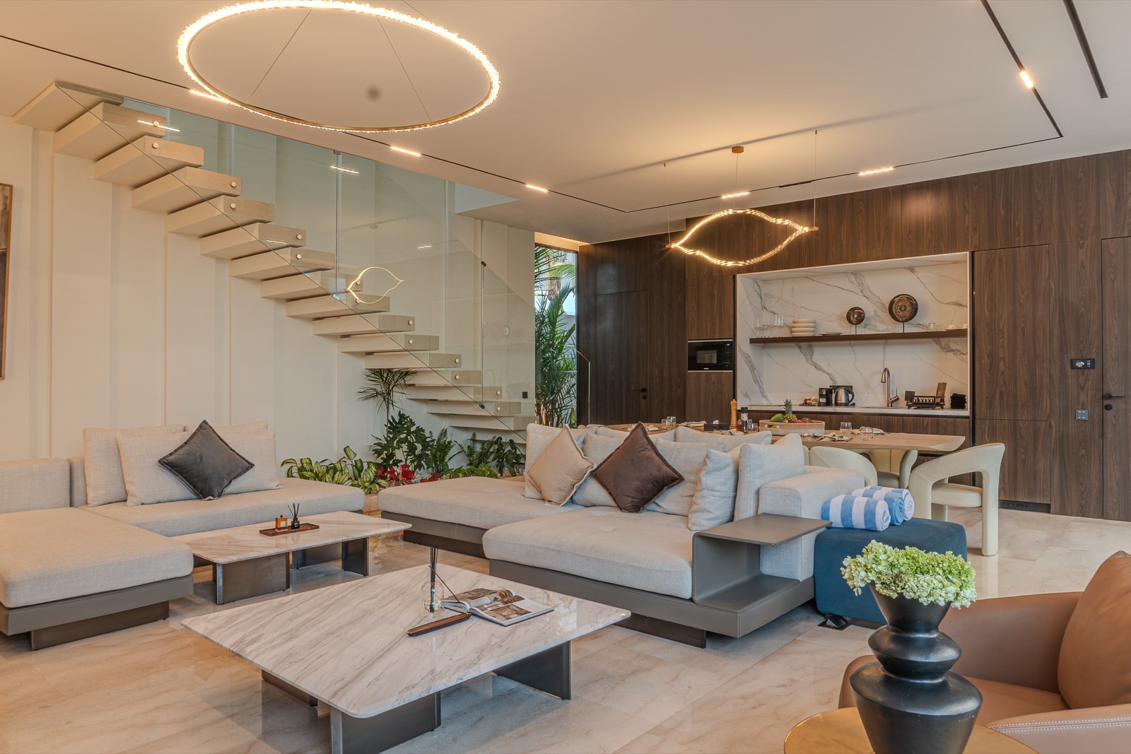 Living room beneath the floating stone staircase