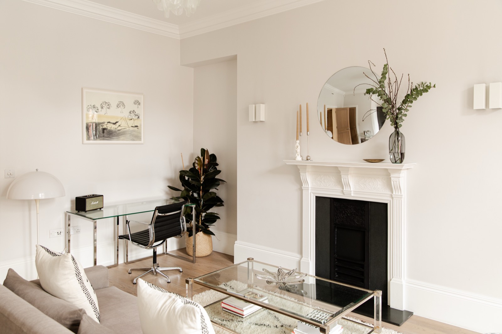 Cast-iron fireplace beside the writing desk