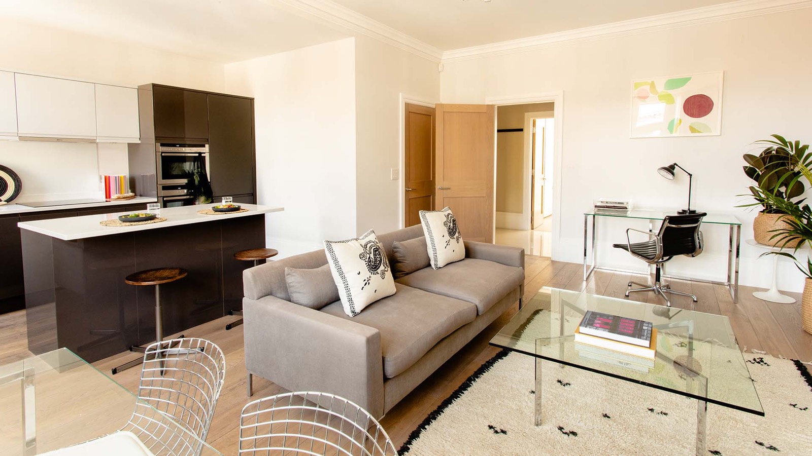 Sitting area with sofa and writing desk