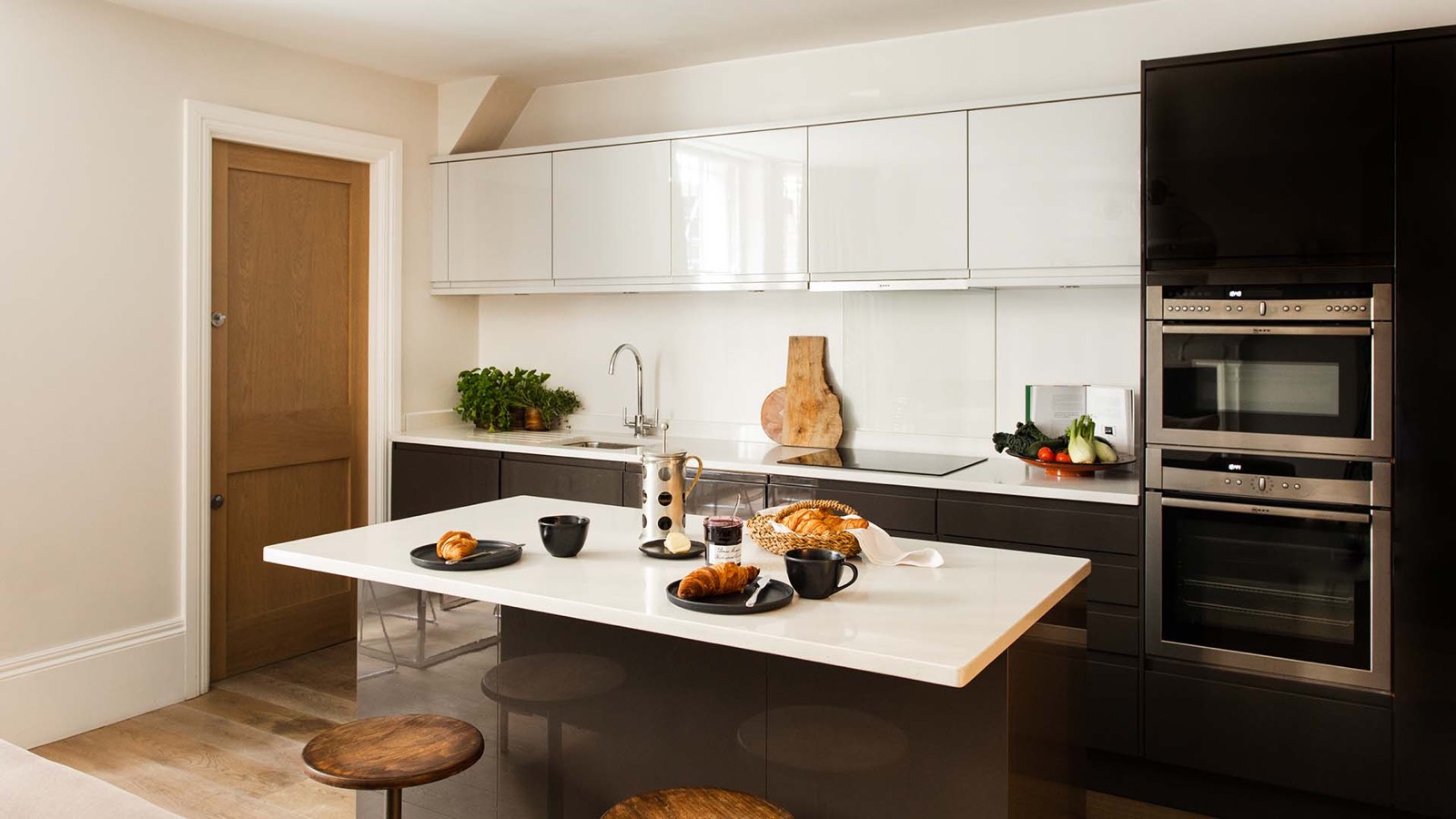 Kitchen island with wooden bar stools