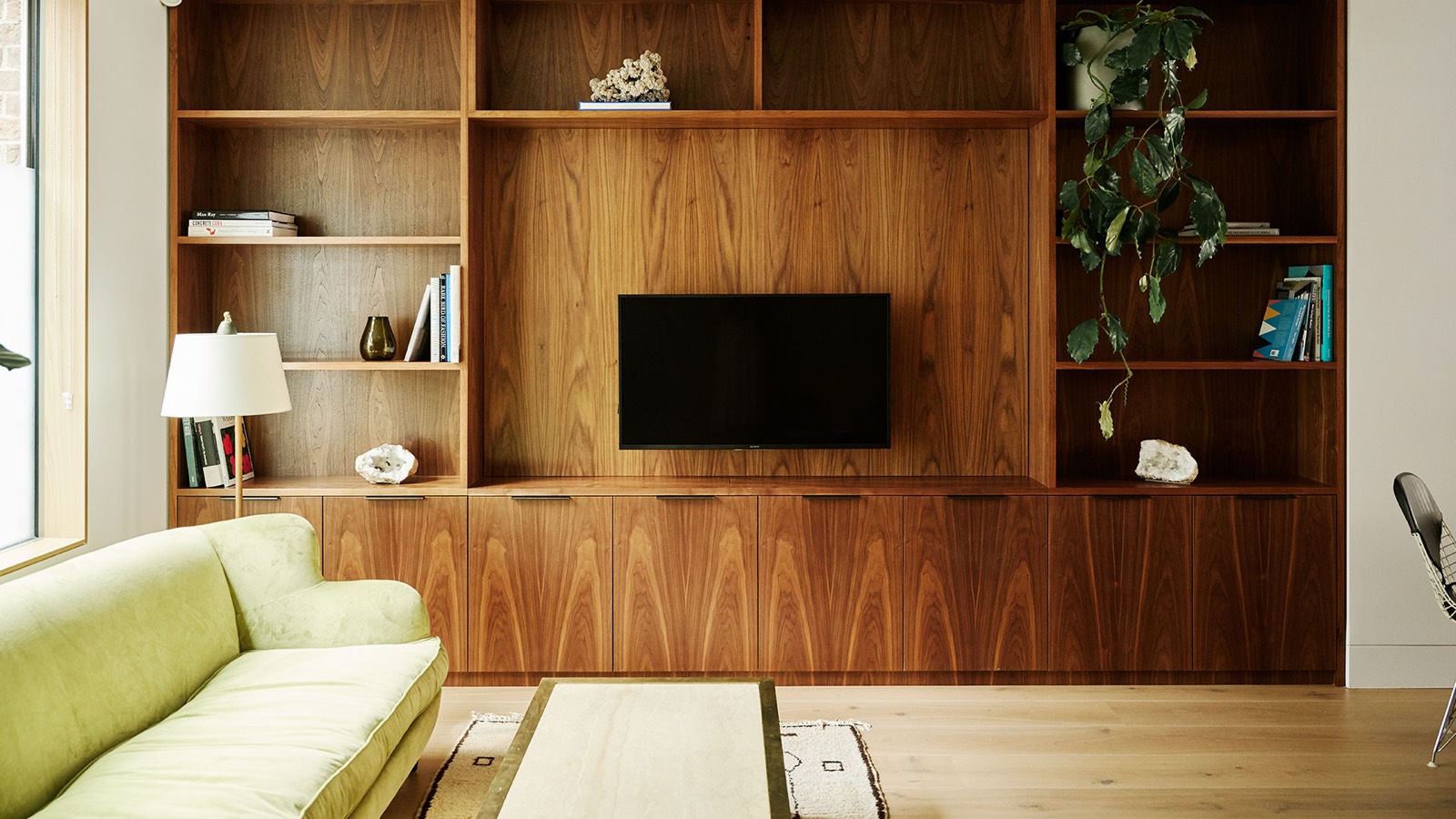 Living area with fitted walnut joinery