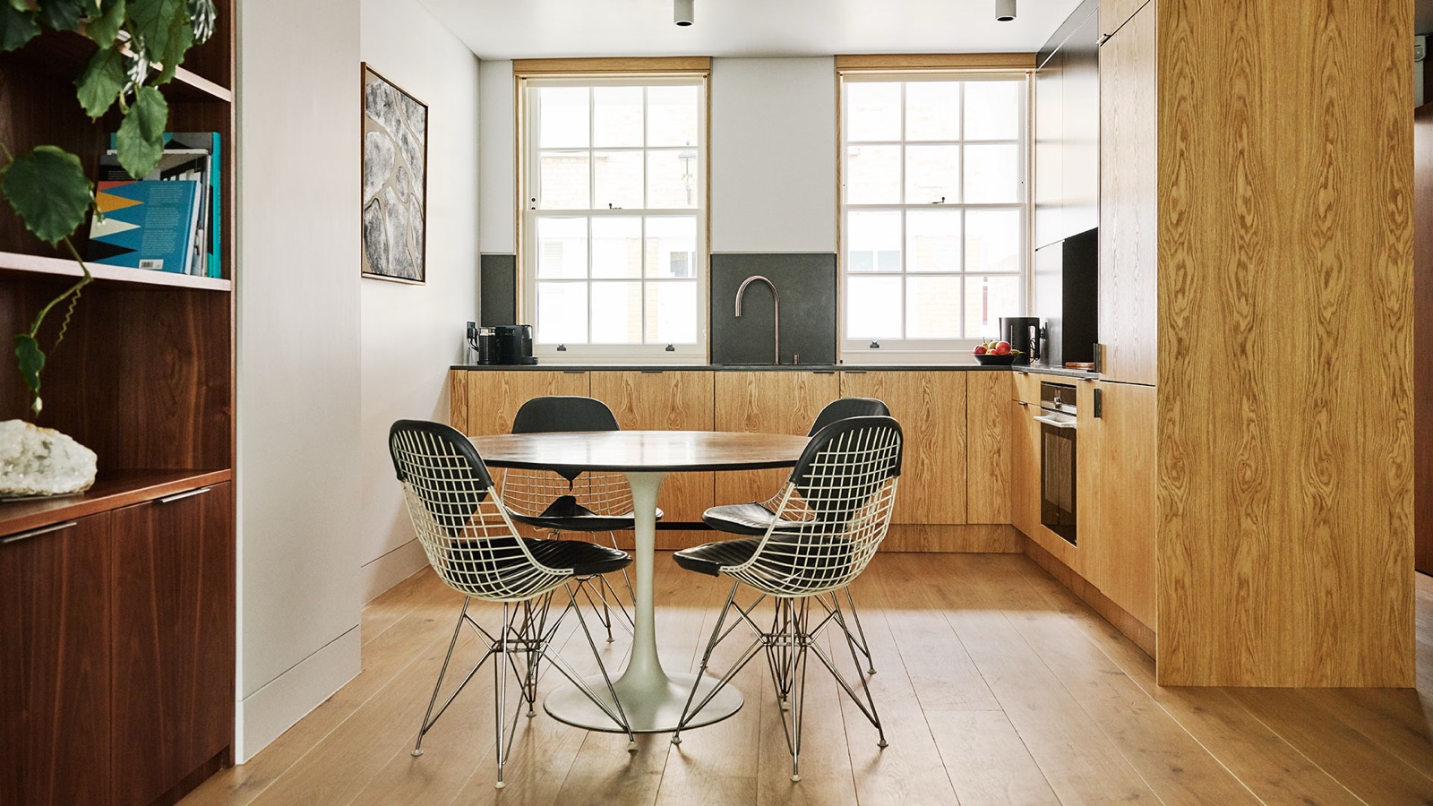 Round dining table beside the open kitchen