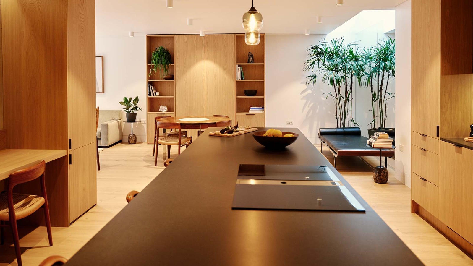 Long kitchen island facing the dining area