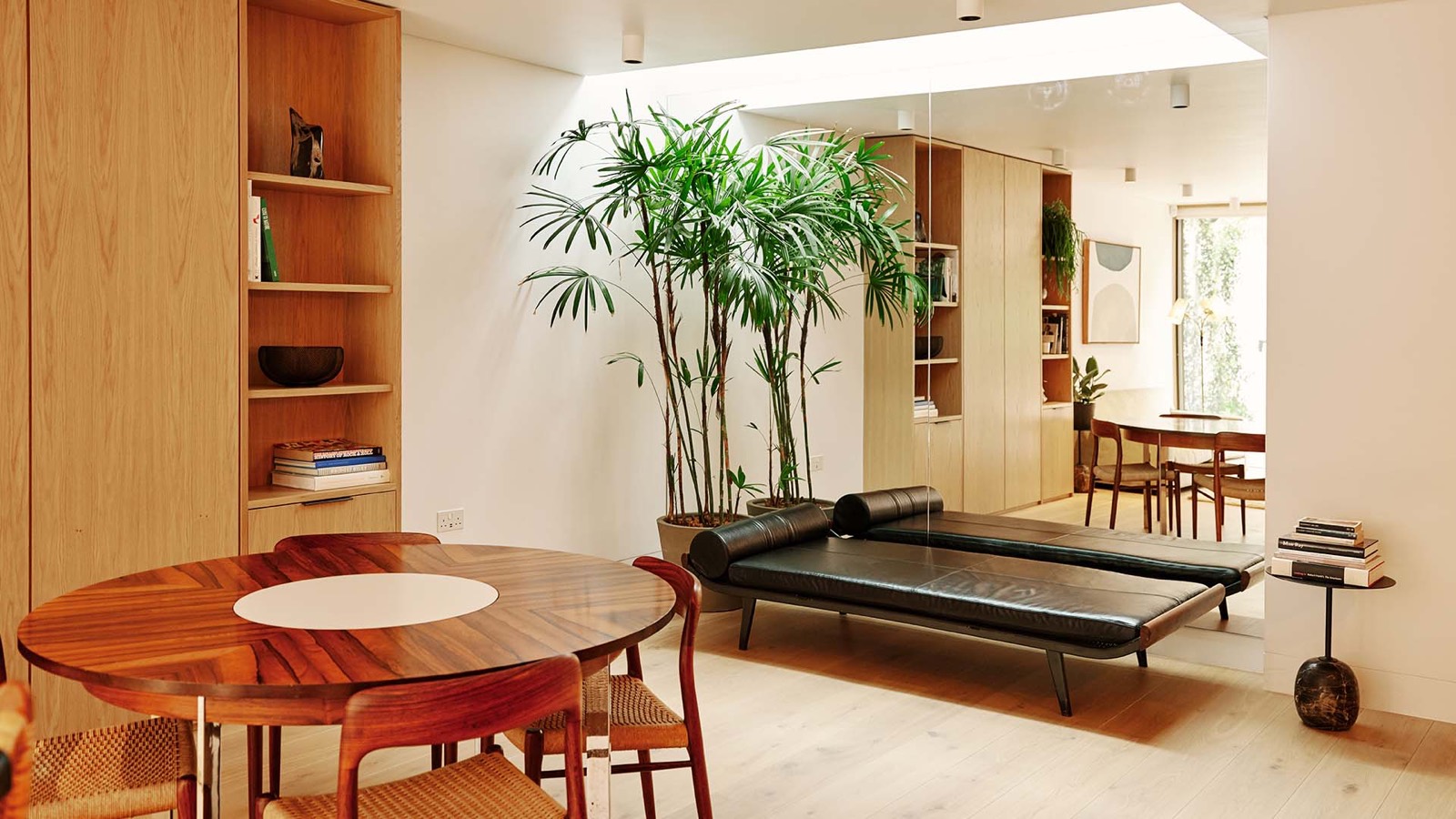 Dining area with mid-century leather daybed